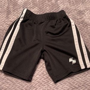Black athletic shorts. 4t
